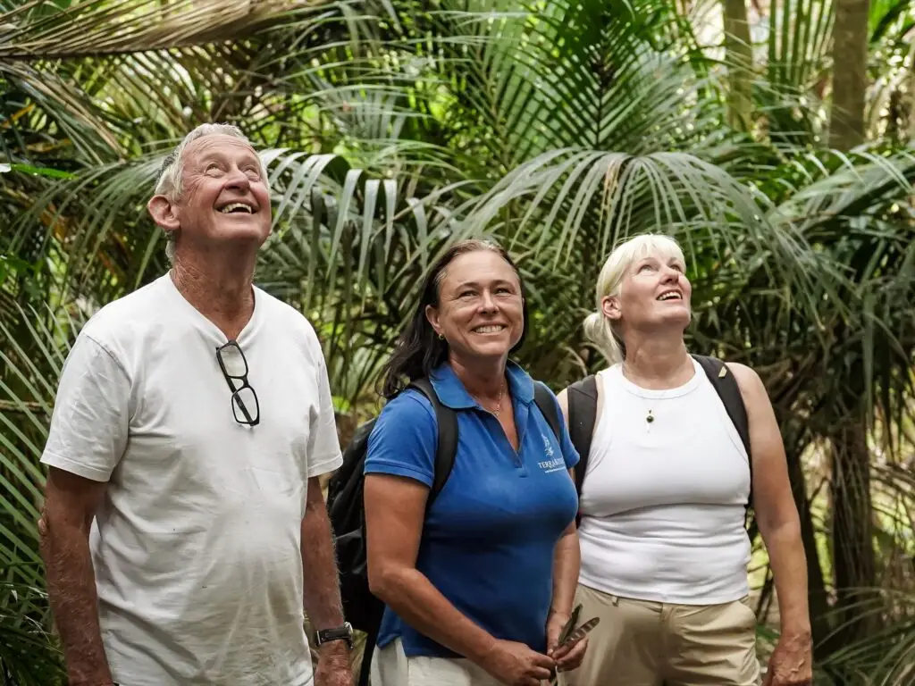 Guest and guide in the Puriri Grove, Terra & Tide Bush & Beach Walk