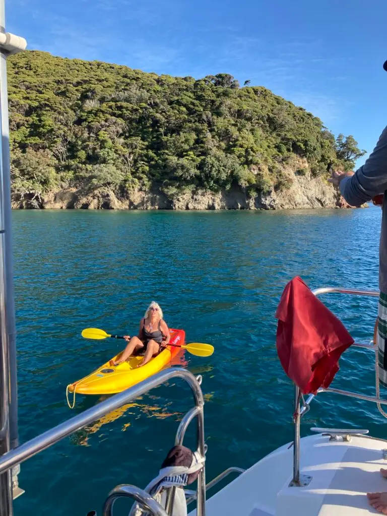Guest kayaking at Great Barrier, Terra & Tide Hauraki Gulf Eco Sailing Adventure