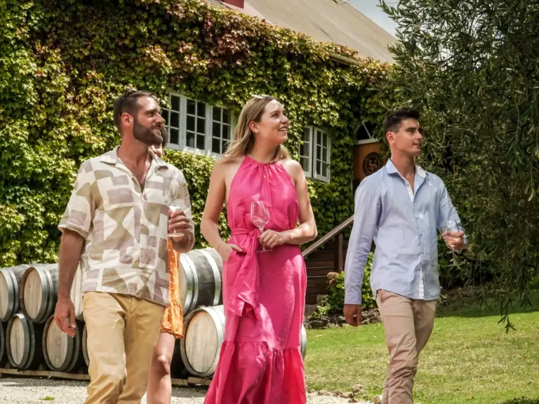 Guests at Stonyridge vineyard on a private Waiheke Island wine & food tour with Terra & Tide