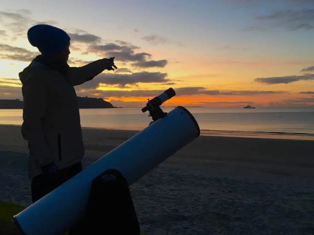 Telescope on Onetangi Beach during a Waiheke stargazing tour with Terra & Tide