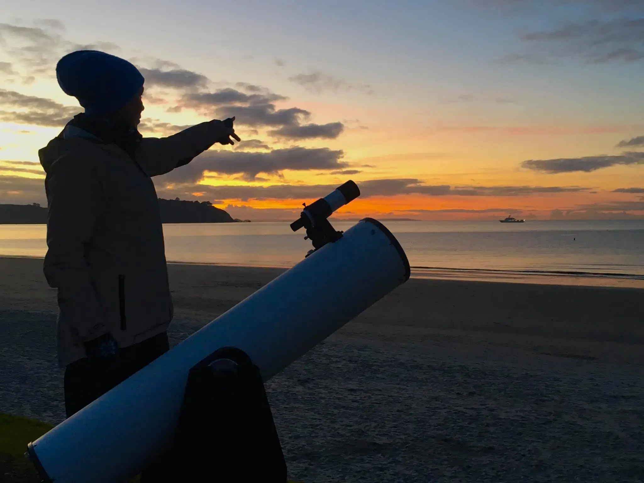 Telescope on Onetangi Beach during a Waiheke stargazing tour with Terra & Tide