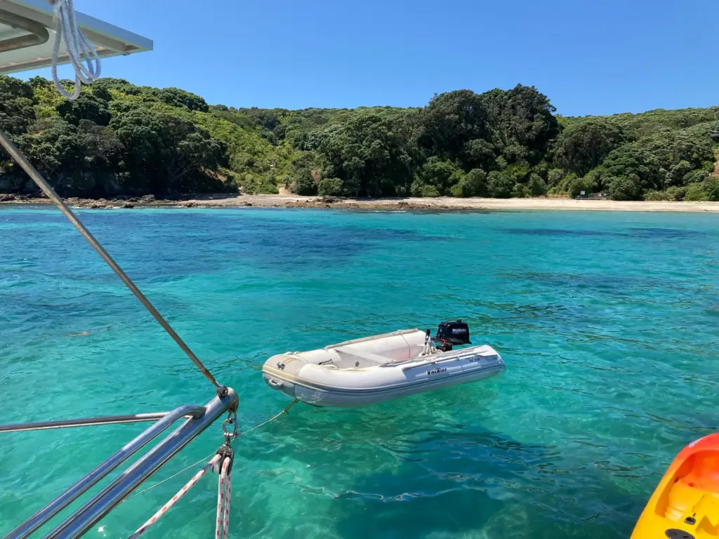 Pacific Star at Hobbs Beach, Tiritiri Matangi, on one of Terra & Tide's exclusive Auckland sailing charters