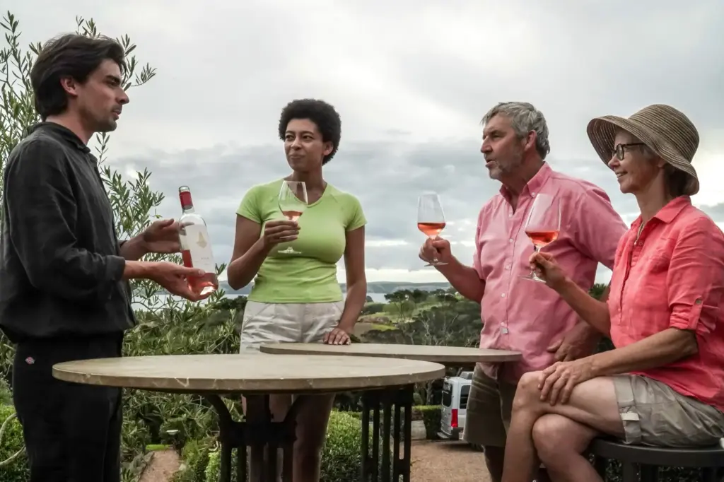 Wine tasting at Mudbrick Vineyard with views over the Hauraki Gulf